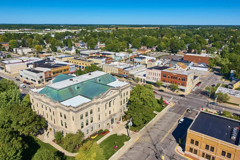 Aerial view of downtown Auburn, Indiana on a clear, sunny day.
